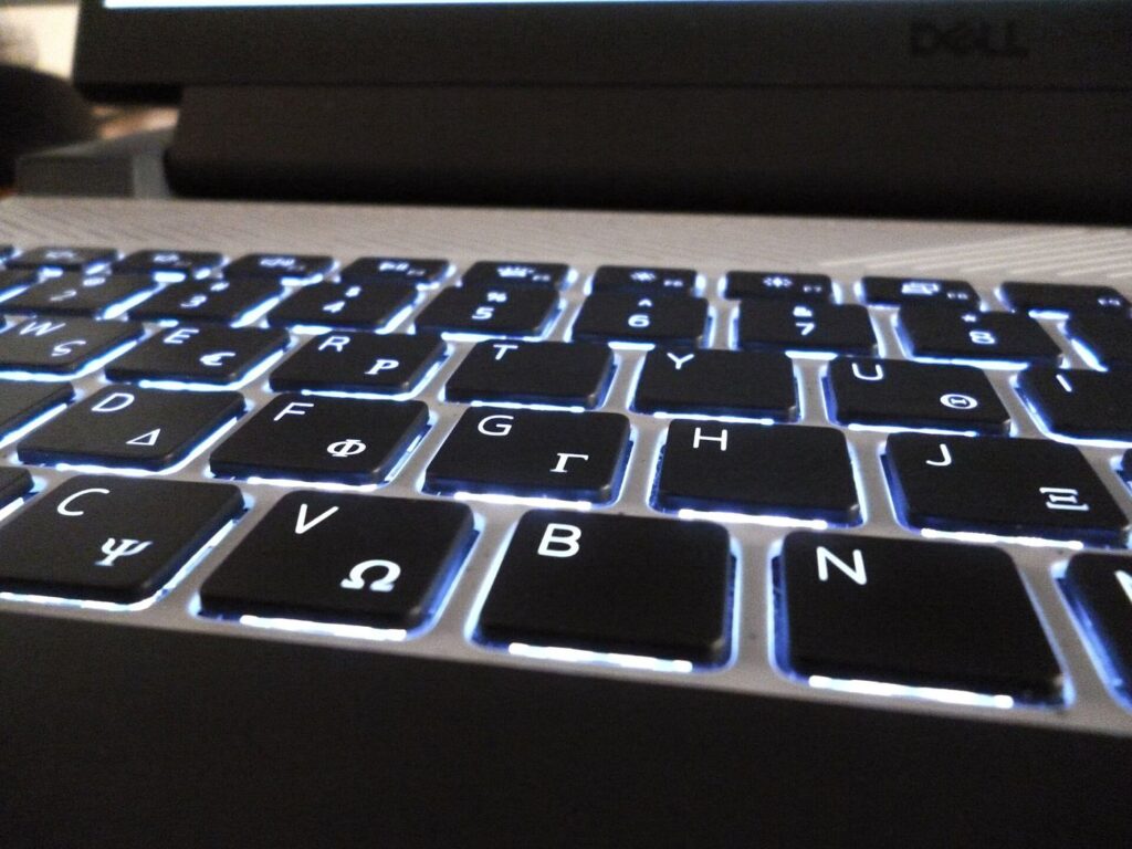 Audit Browser Permissions To Protect Laptop Privacy Laptop user reviewing website permissions in browser privacy settings