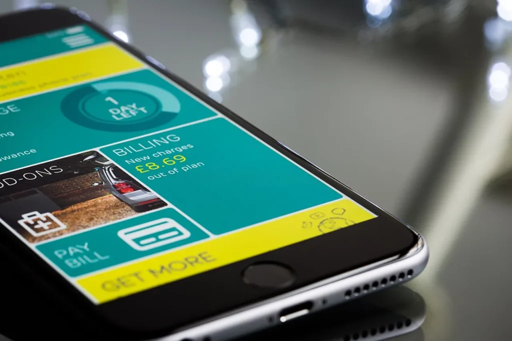 Fintech Myths: What Apps and Robo-Advisers Can and Can’t Do Close-up of a smartphone showing a mobile billing and payment app, illustrating fintech services
