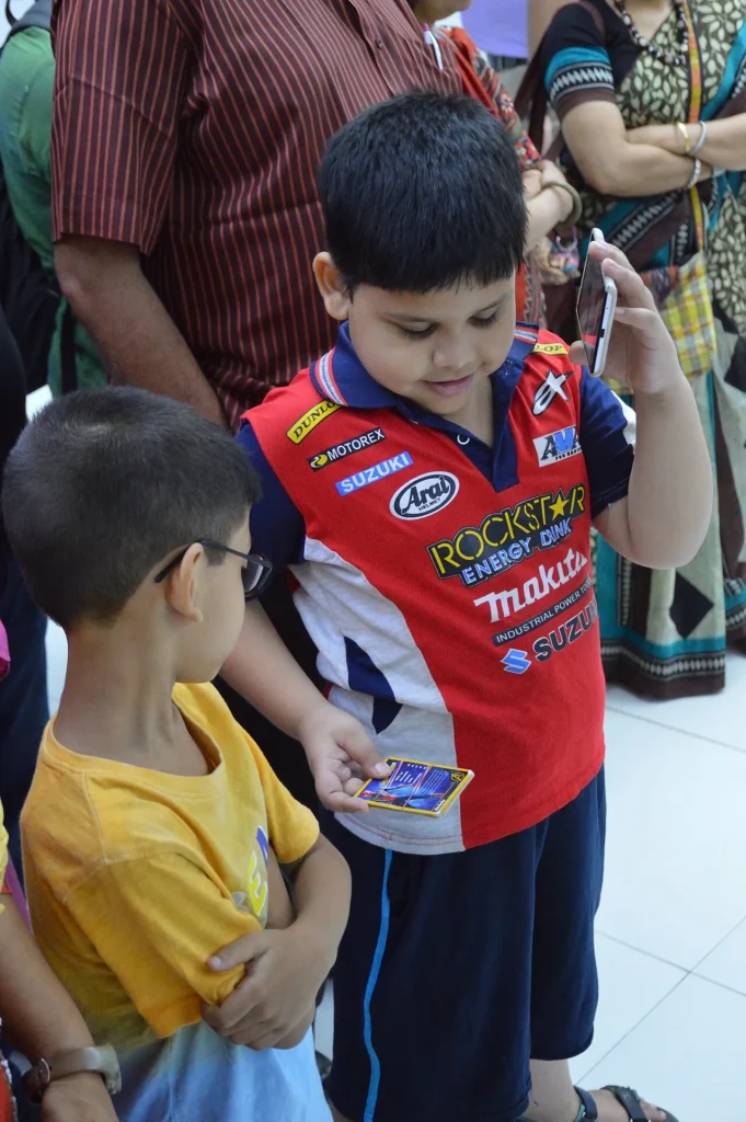Mexico Wants Platforms to Protect Minors: The Tech Angle Children playing with a smartphone, illustrating minors and mobile platforms